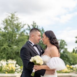 Adrian looking at Ewelina lovingly during their wedding ceremony photos