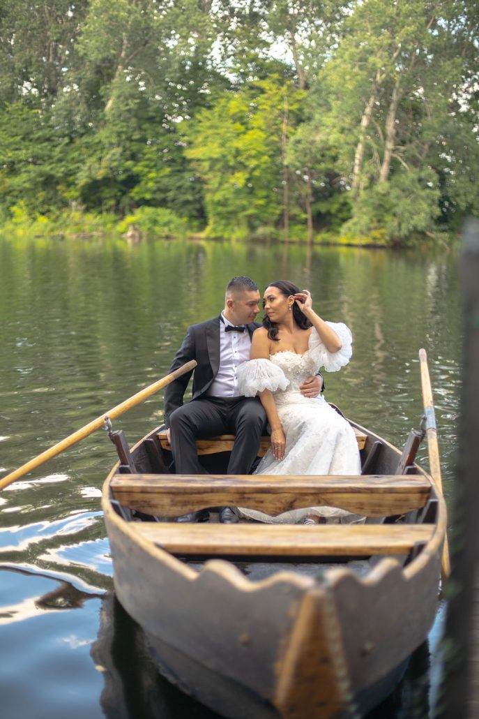 Bride Ewelina and groom Adrian holding hands during their romantic wedding session