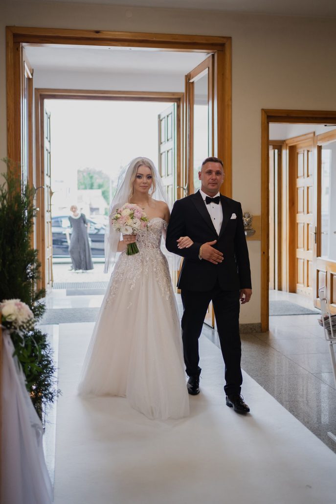 Natalia’s bridal portrait showing her dress and bouquet details